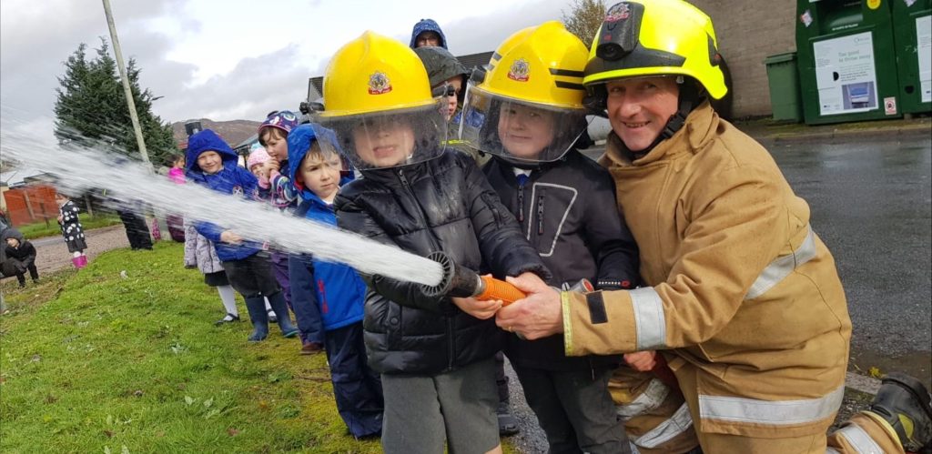Stanley and Harvey with their Pops at Newtonmore Fire Station