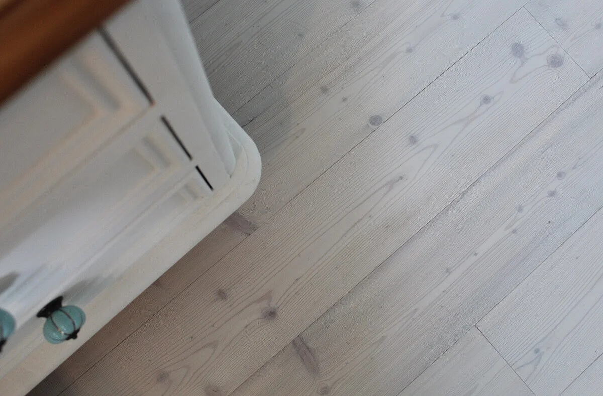 Larch Flooring (unfinished sanded) 135 x 19mm, hand oiled on-site with White Osmo Polyx® Hardwax Oil