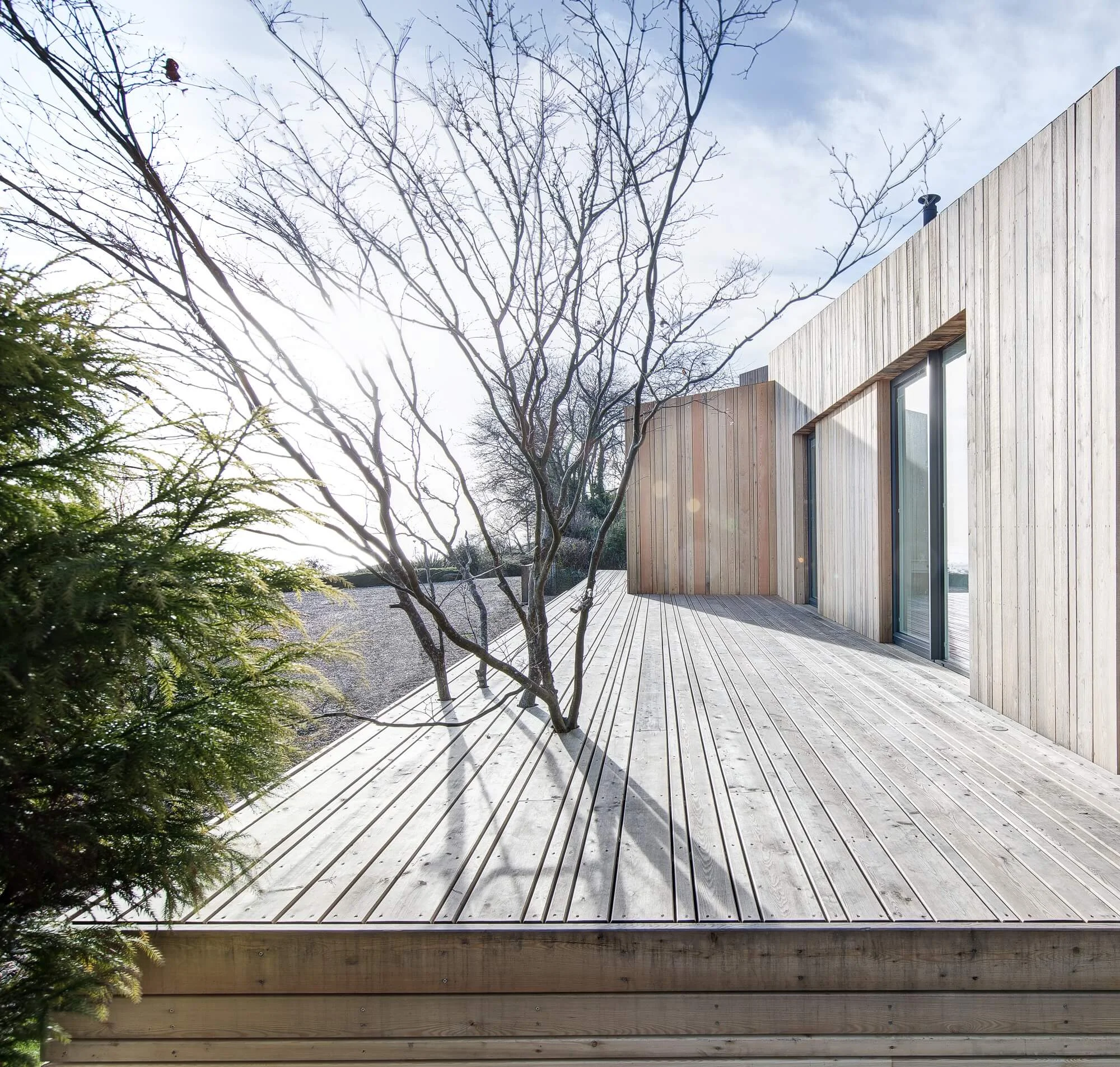 SILA Select® used in varying widths for cladding, wooden roofing and SILA RW207 143 x 28 4RA decking