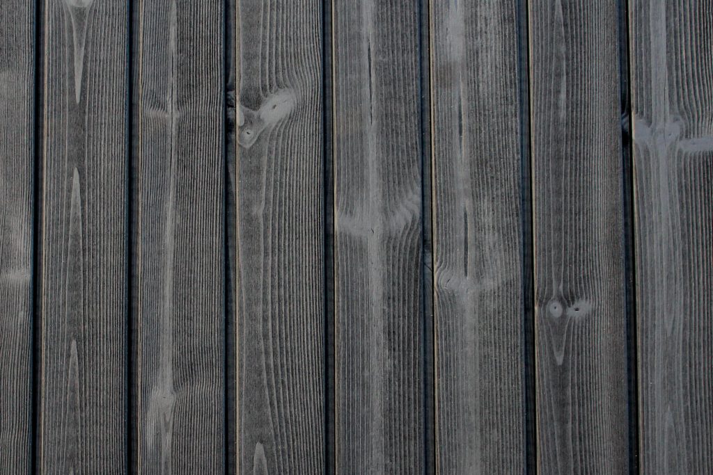 Thermopine® cladding factory coated with Woca Oil in Black