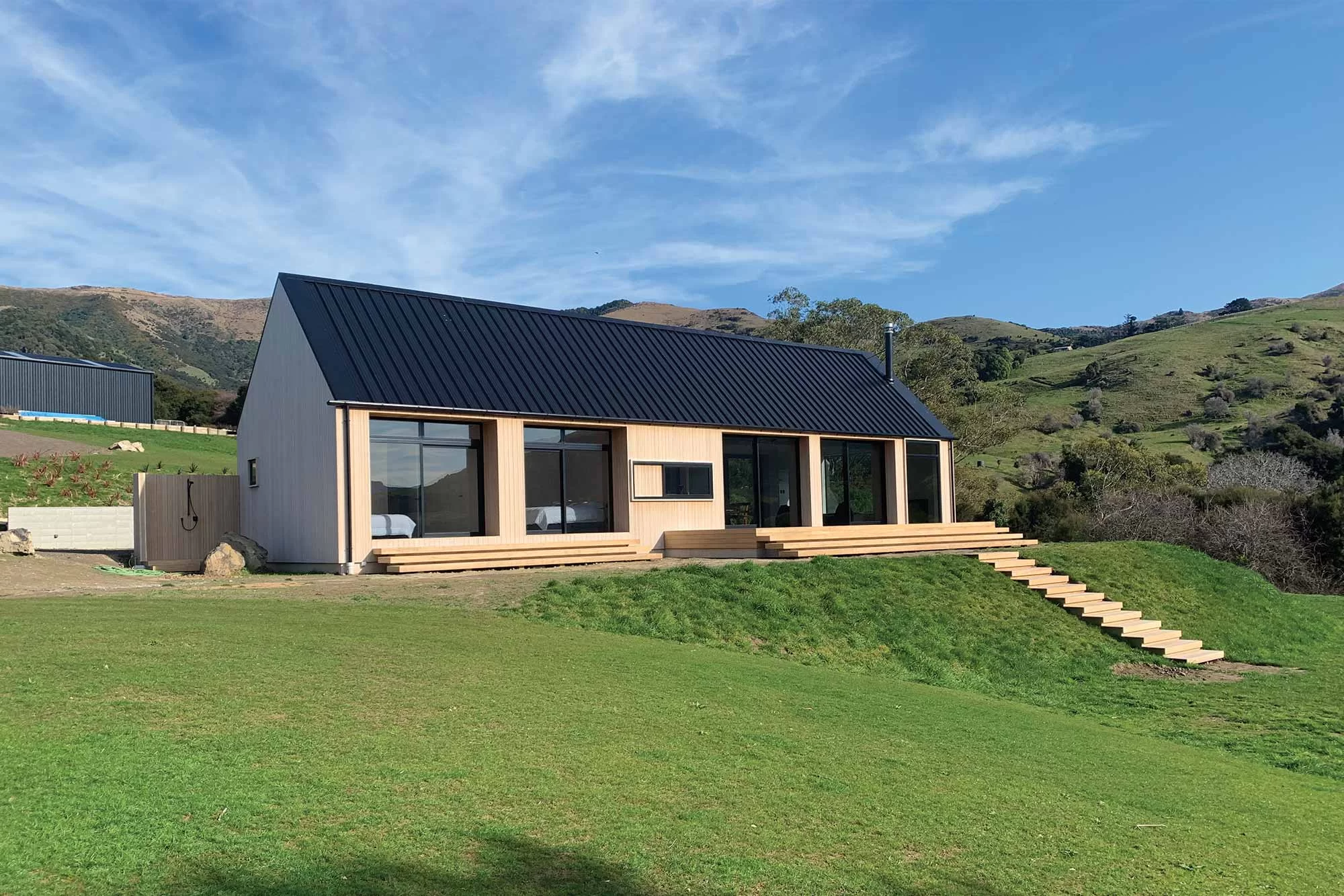 Abodo cladding coated with SiOO:X on Peninsular House
