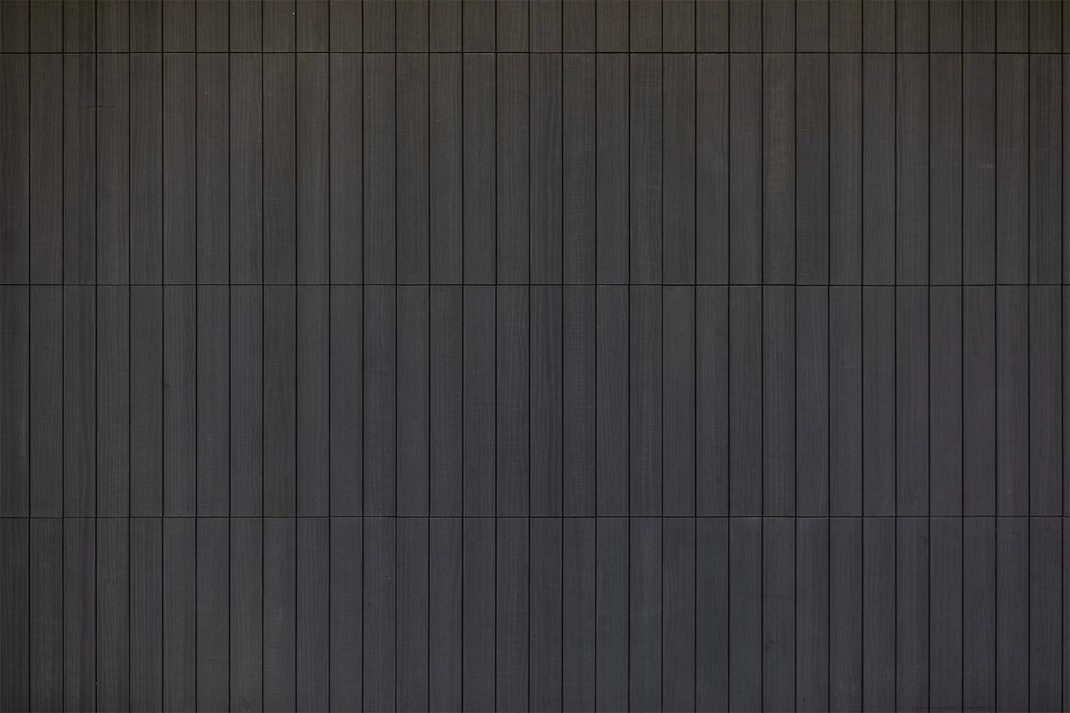 Abodo Vulcan Vertical Grain cladding with black paint