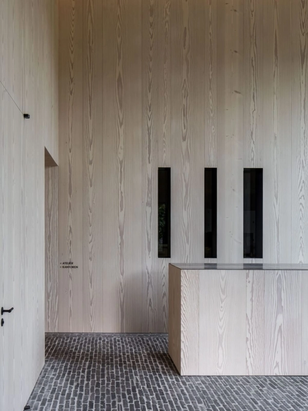 Russwood Douglas Fir Flooring prefinished in Signature White in a modern house with an island.