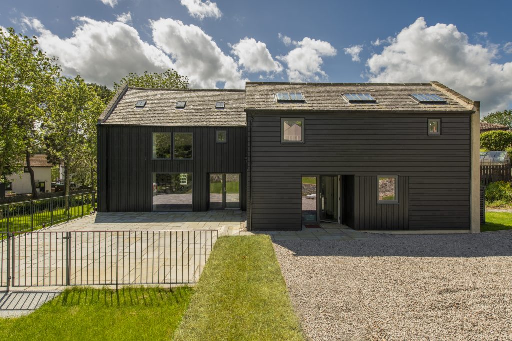 Upper Kennerty Mill featuring Thermopine RW014 , Microtex, RAL 7021 by Annie Kenyon Architects
