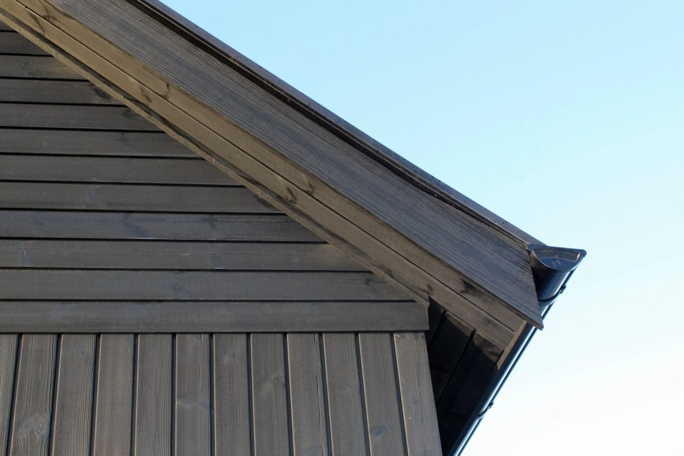 Thermopine® cladding factory coated with Woca Oil in Black