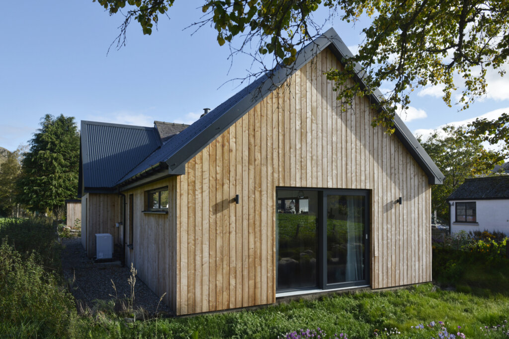 Gable end of a home in the Scottish Highlands timber clad in Scotlarch