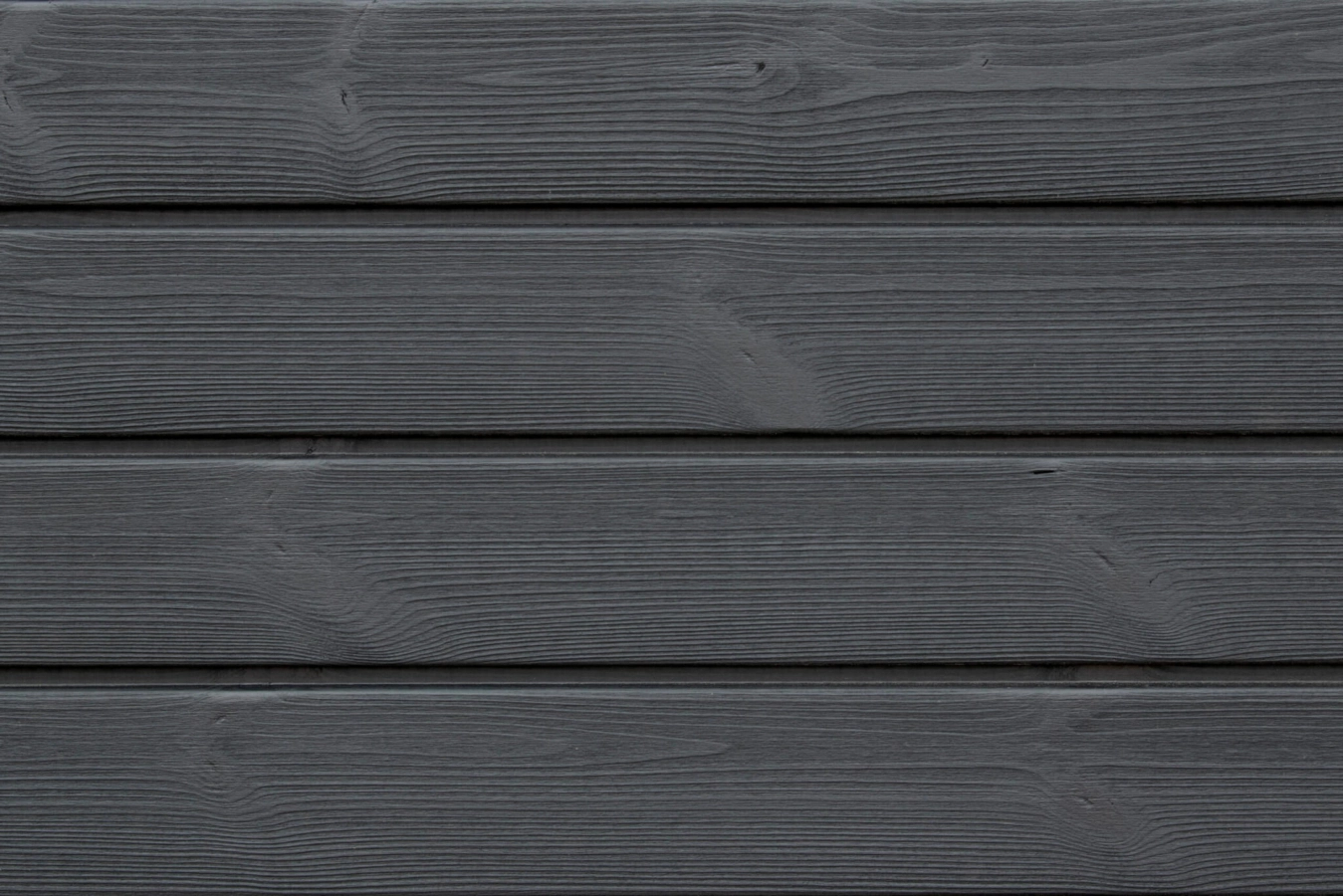 Brushed Thermopine® cladding coated in Black oil
