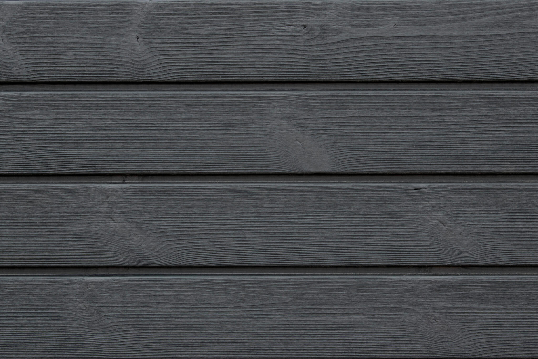 Brushed Thermopine® cladding coated in Black oil