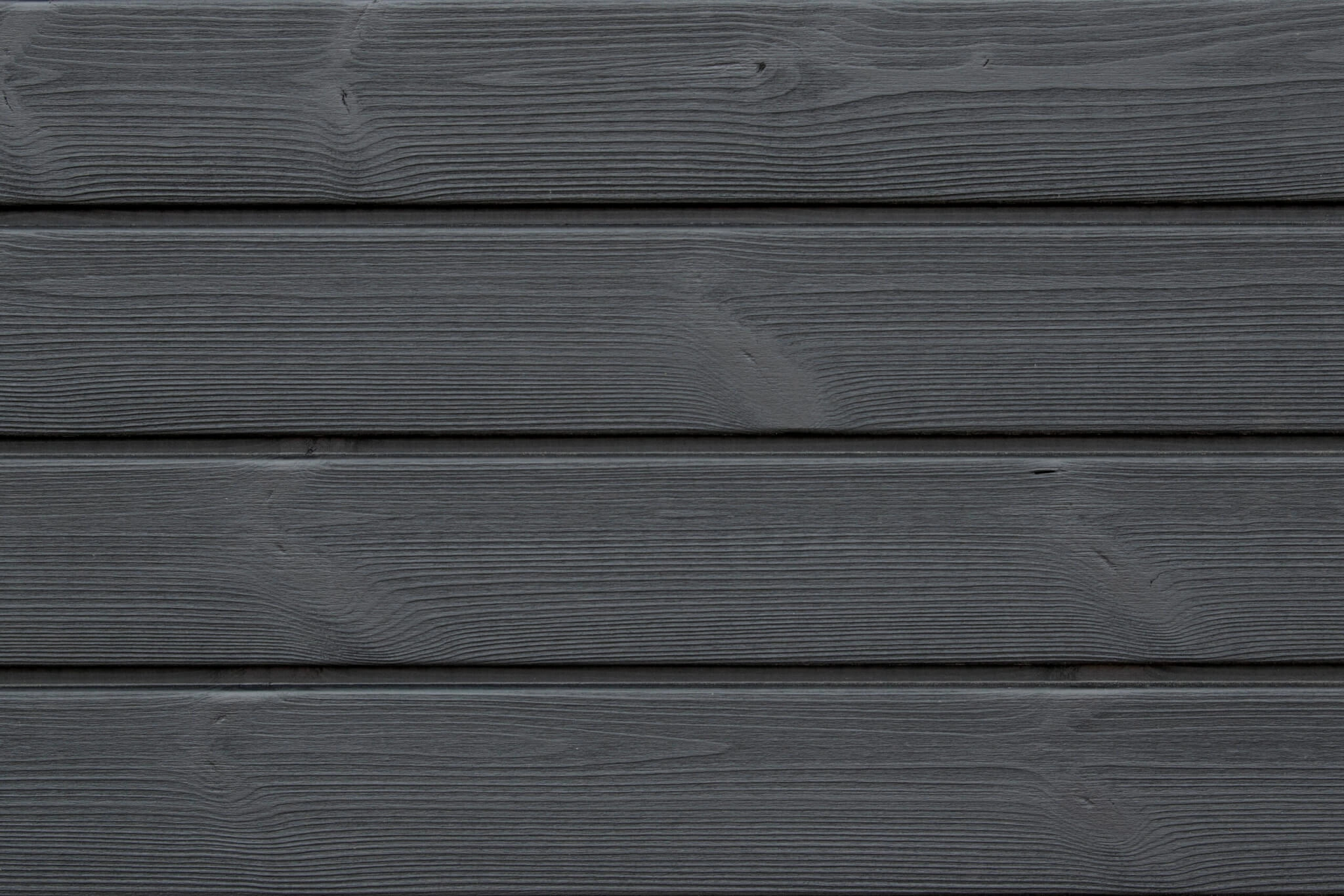 Brushed Thermopine® cladding coated in Black oil