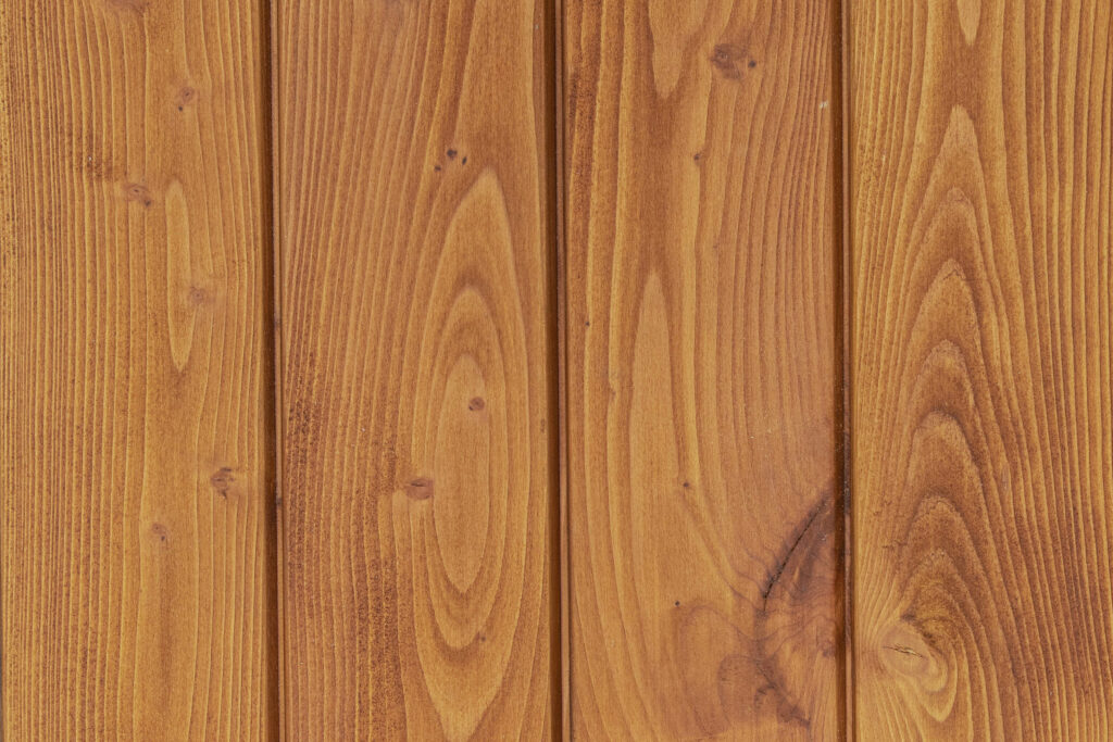Scotlarch cladding coated in Woca Oil Teak