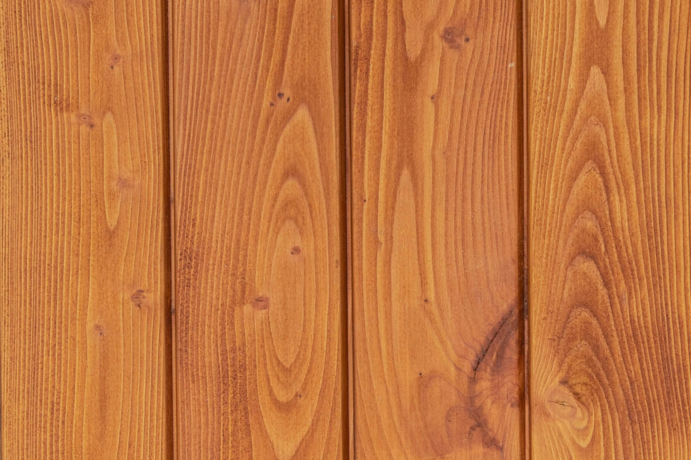 Scotlarch cladding coated in Woca Oil Teak