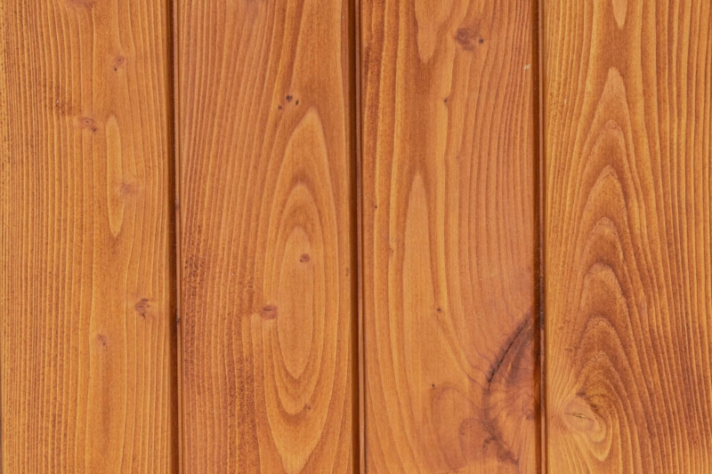 Scotlarch cladding coated in Woca Oil Teak