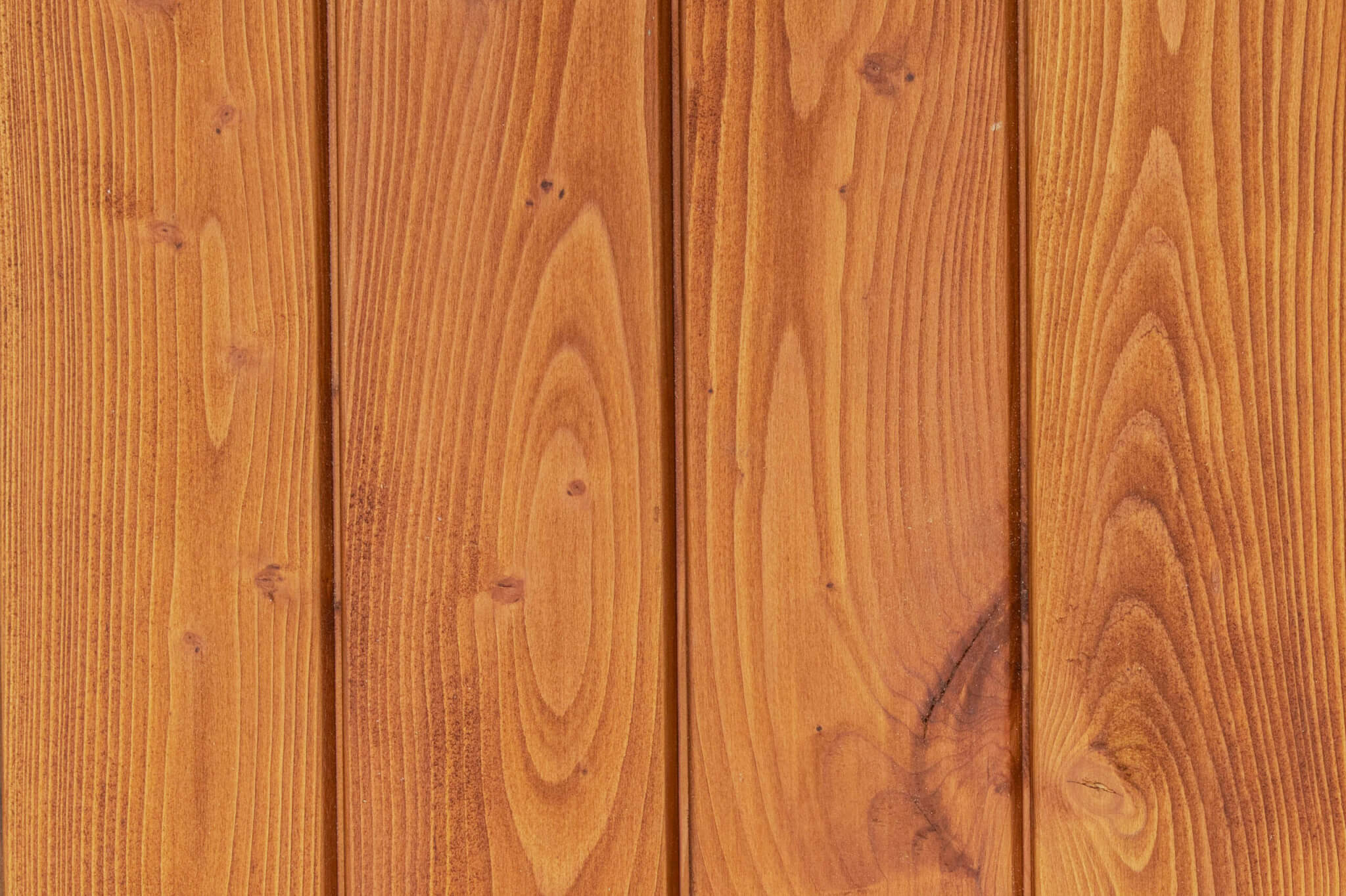Scotlarch cladding coated in Woca Oil Teak