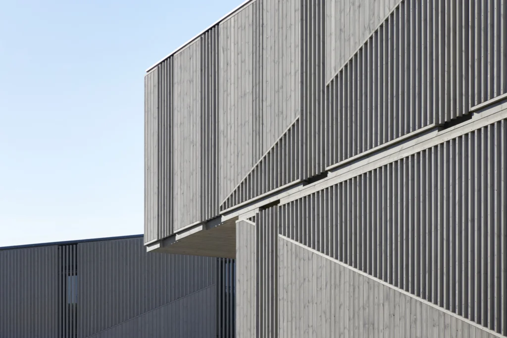 Solar shading and fin detailng on timber cladding at Escapade Silverstone.