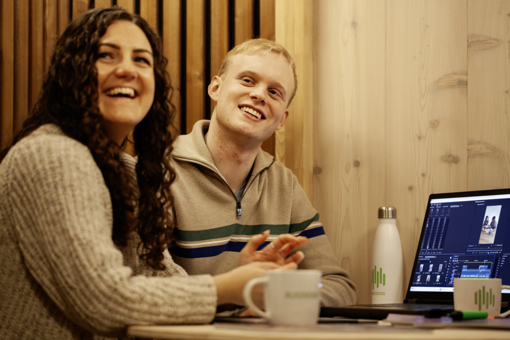 Amy (Marketing Executive, left), Connor (Marketing Assistant, right), during a marketing meeting. 