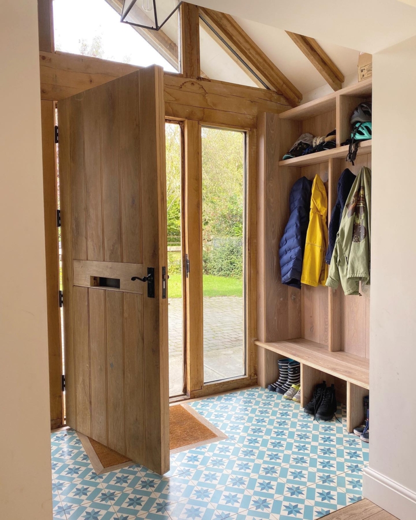 Boot room featuring a creative use of leftover flooring