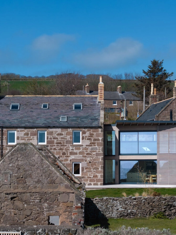 Thermopine® Clear with a SiOO:X Mid Grey coating and Abodo VG fins on the Johnshaven Extension project.