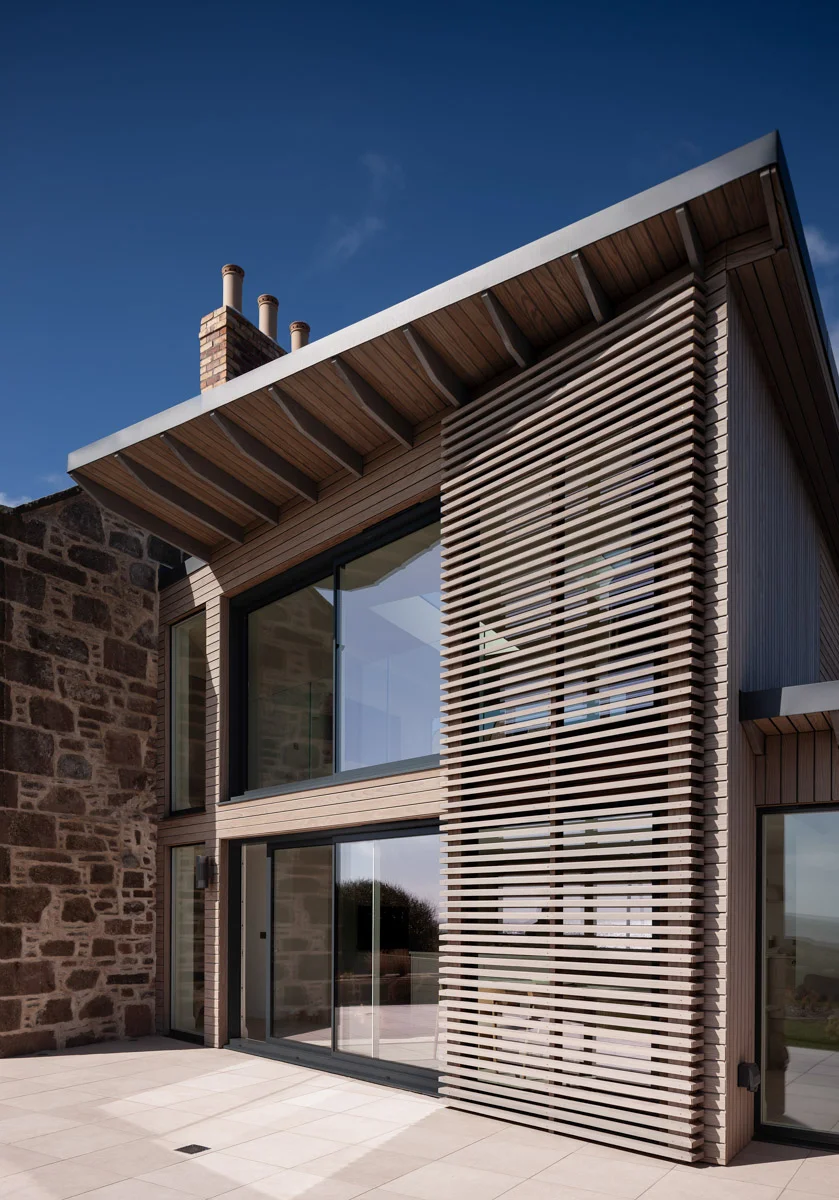 Thermopine® Clear with a SiOO:X Mid Grey coating and Abodo VG fins on the Johnshaven Extension project.